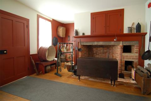 Some scholars believe the Smith family was in the summer kitchen using the fireplace to keep warm. Joseph would have been taken out through the door seen at the left. Taken in 2008.
